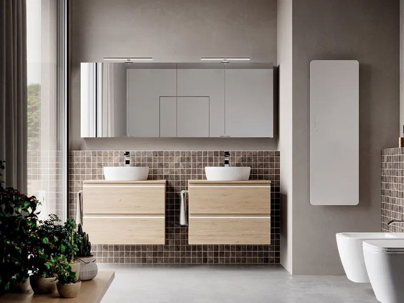 Forme pure per i mobili sospesi fanno da contrasto all'armoniosità dei lavabi in ceramica - composizione 07 collezione System di Ideagroup