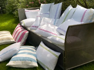 divano con cuscini bianco riga colore bellora
