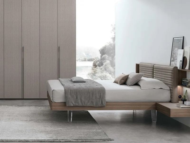 Nel sistema letto Yuki Tomasella sono integrati i comodini sospesi 