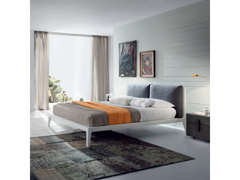 Testata letto con cuscini