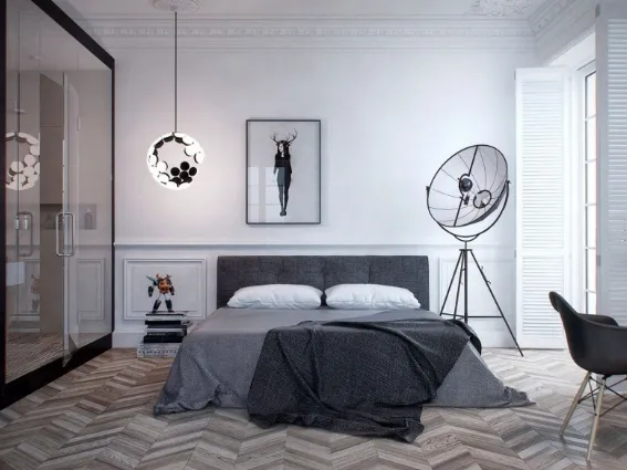 parete letto decorata con cornici