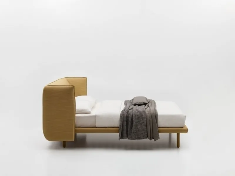 letto con testiera in tessuto