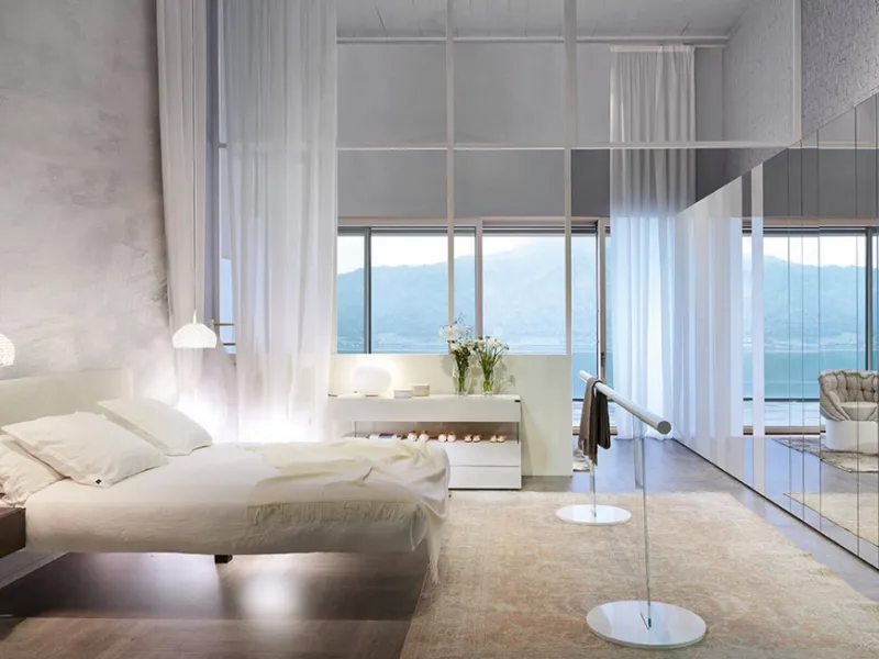 Design toni dei bianchi con il letto sospeso Fluttua di Lago