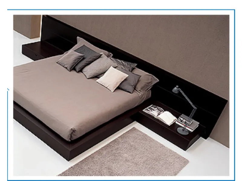 letto di colore scuro con comodini annessi