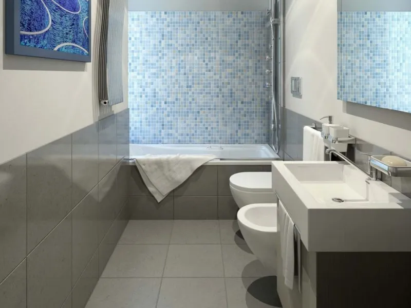 Bagno rettangolare con vasca in fondo 