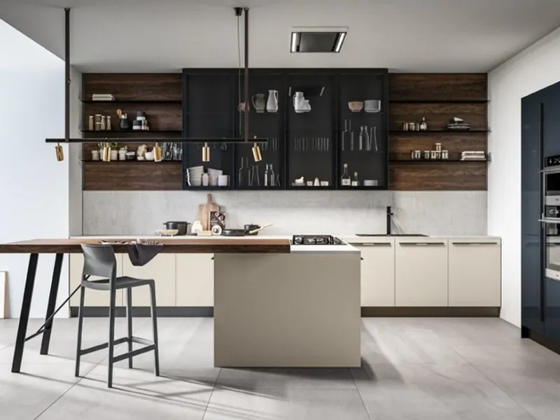 Effetto legno per il tavolo abbinato all’isola della cucina Round by Arredo3