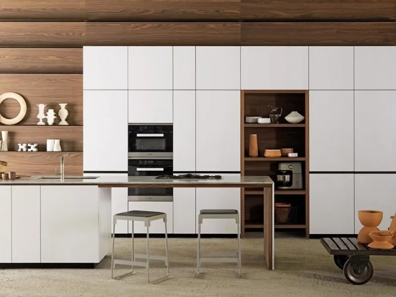 Unicuum tra isola e tavolo per Forma Mentis Laccato opaco bianco ghiaccio by Valcucine
